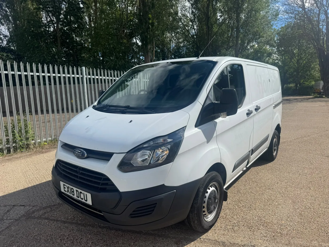 White Ford Transit Custom panel van recently purchased by European Commercials