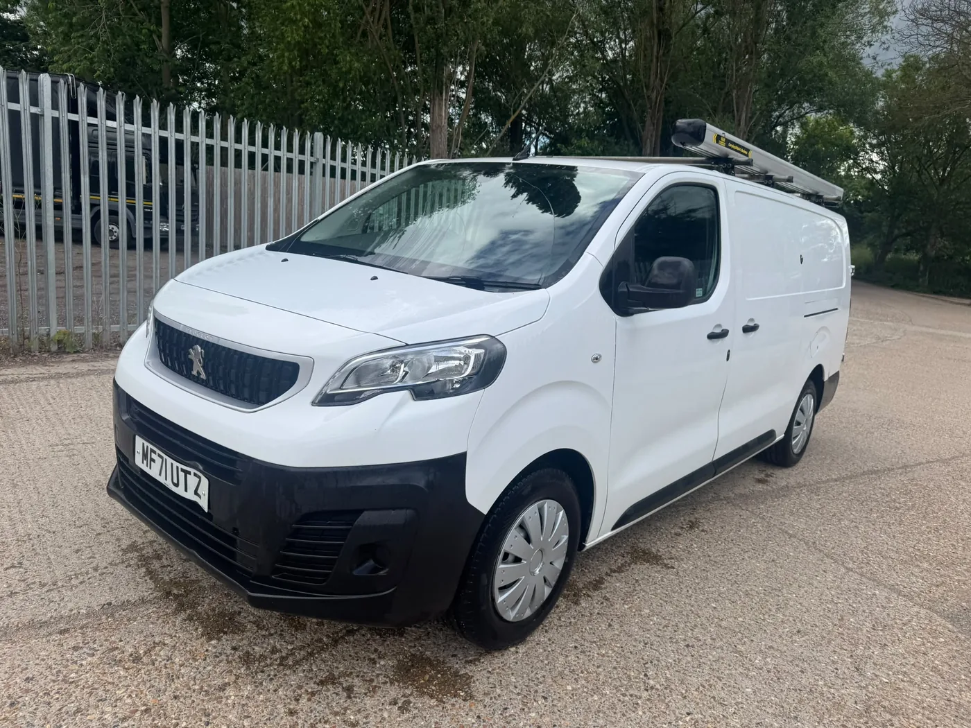 White Peugeot Expert panel van with rear power supply recently purchased by European Commercials